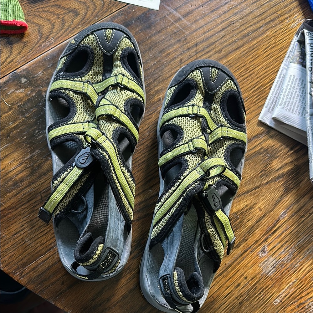 Green and black Ahnu water sandals